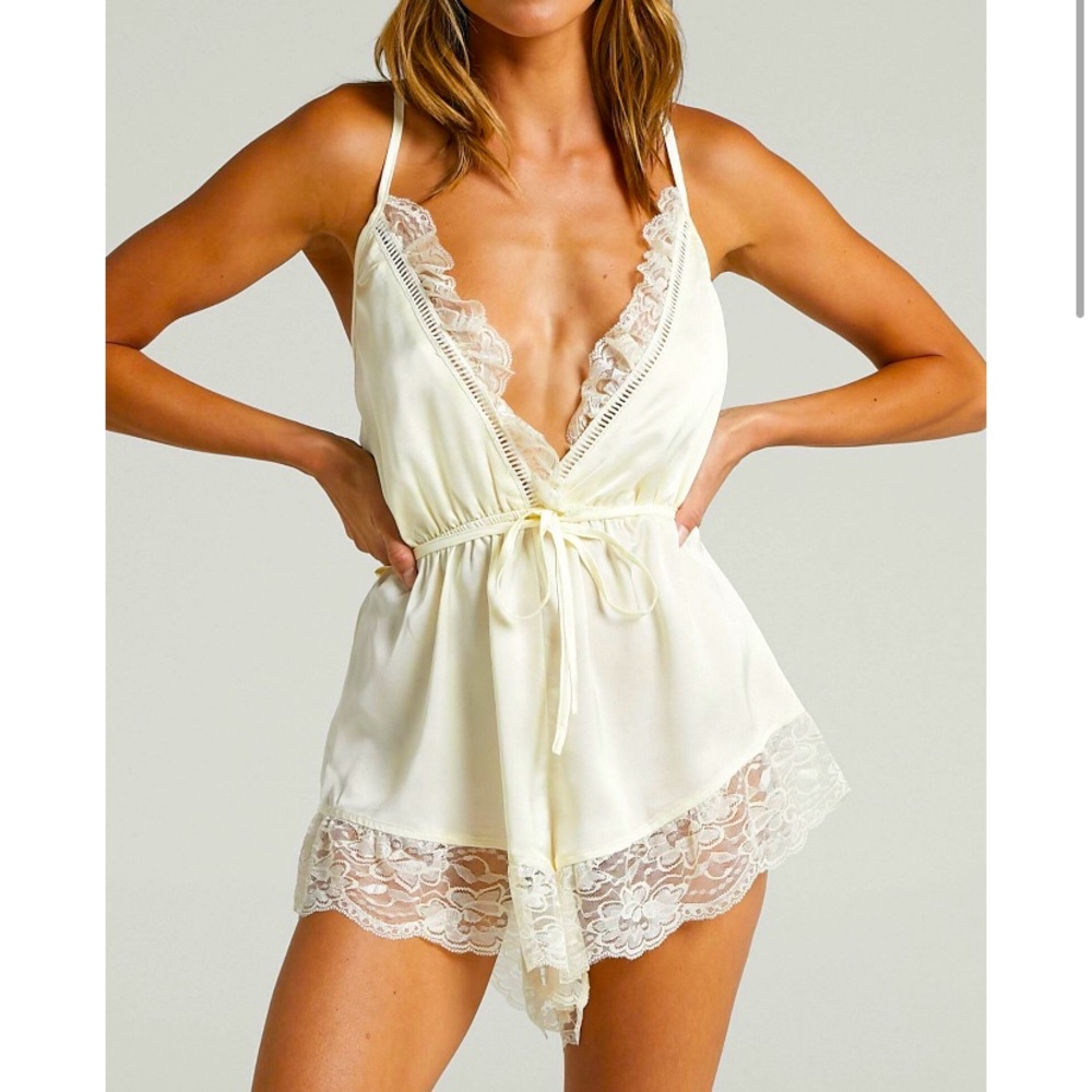 Brand new in packaging-Lace cream romper.